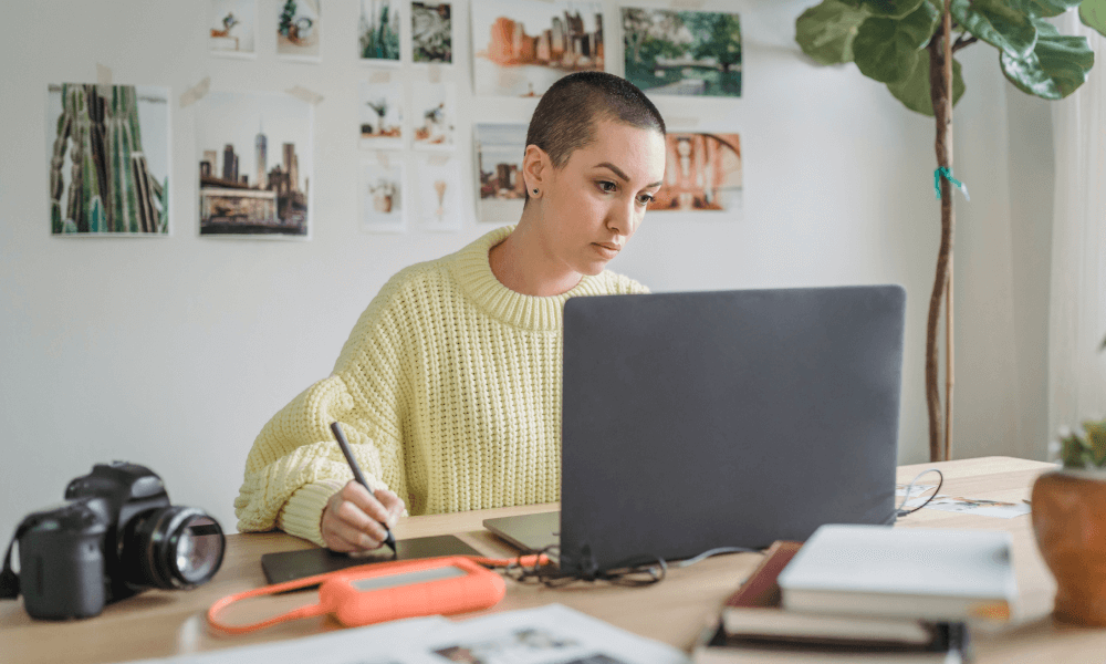 Woman on her laptop creating a fundraising calendar