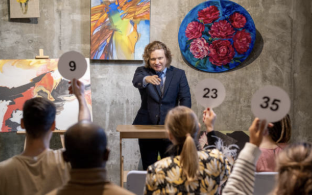 Man moderating an auction