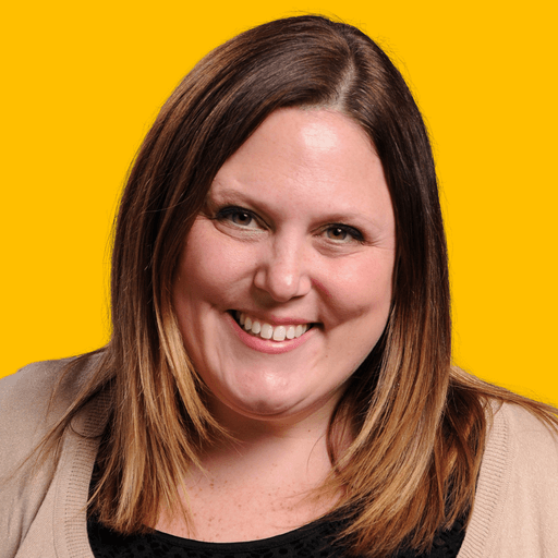 Keely's headshot against a yellow background