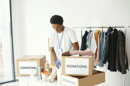 a young man collecting donations
