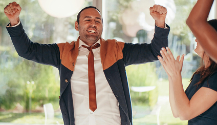 Individual celebrating fundraising goal progress