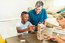 Family playing board game