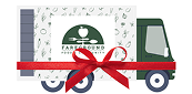 Green truck with Farmbound logo and red gift bow