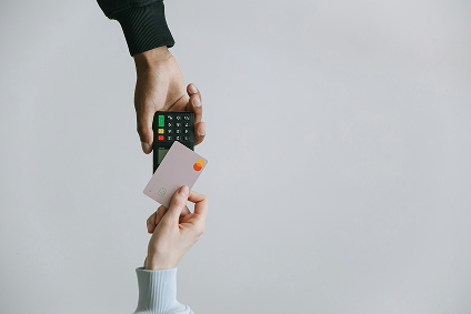 hand holding a card reader